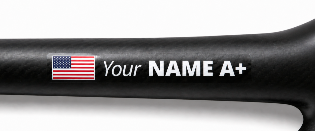 Custom cyclist name and USA flag sticker on a carbon bike top tube
