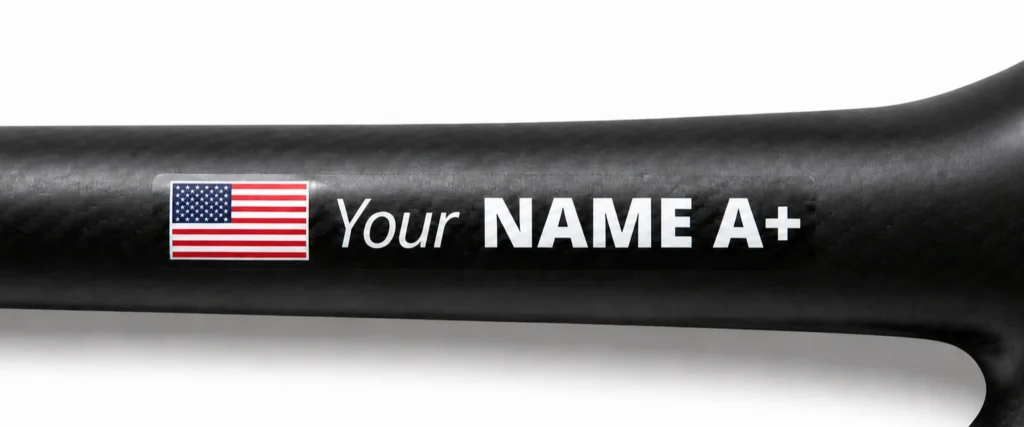 Custom cyclist name and USA flag sticker on a carbon bike top tube