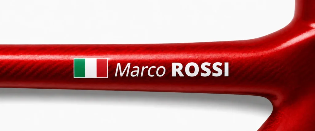Italian name sticker on a red bike frame
