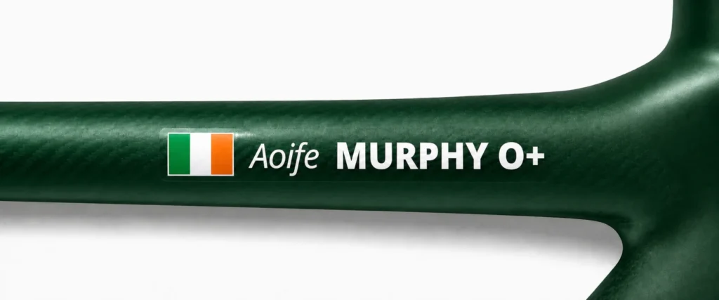 Irish name and blood type sticker on a green bike frame