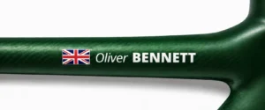 UK name sticker on a green bike frame