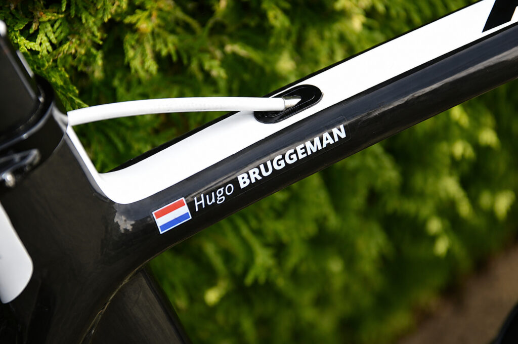 Personalised name and flag sticker on a carbon road bike frame