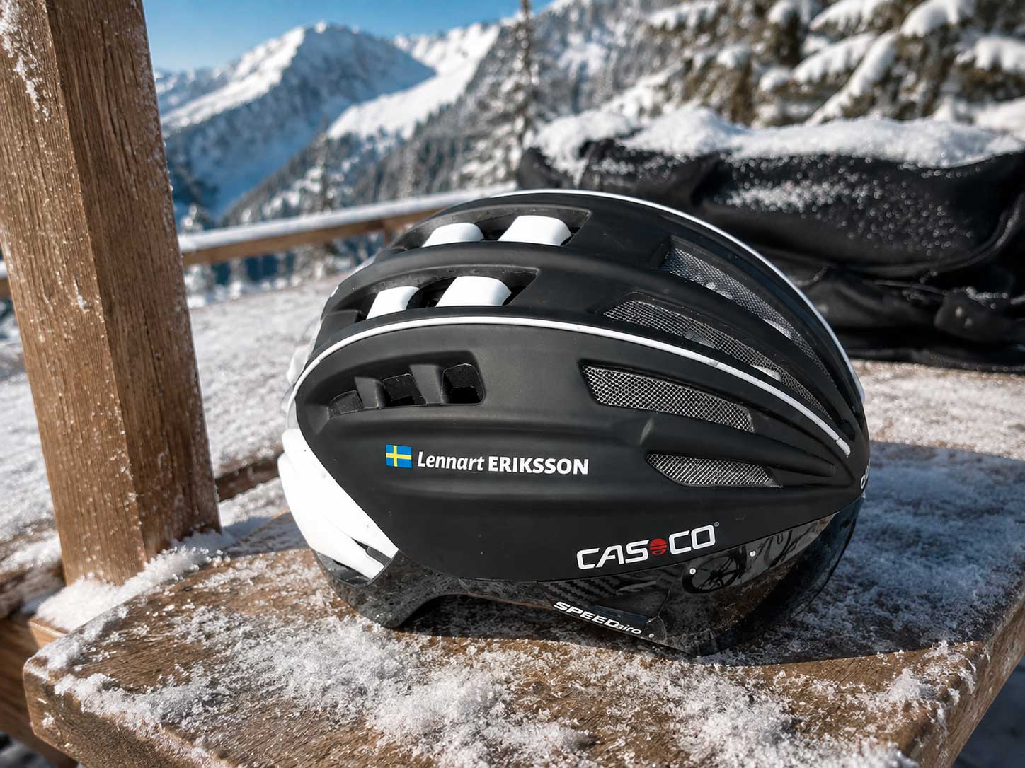 Personalised name sticker on a black cycling helmet