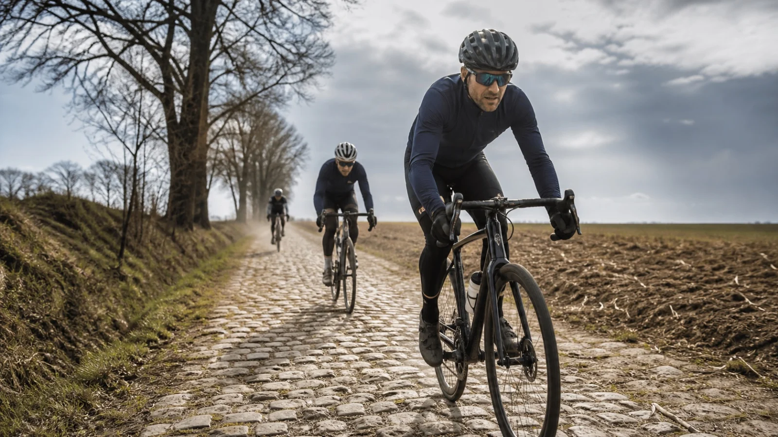 Paris-Roubaix Challenge 2027 riders on a cobbled sector in northern France