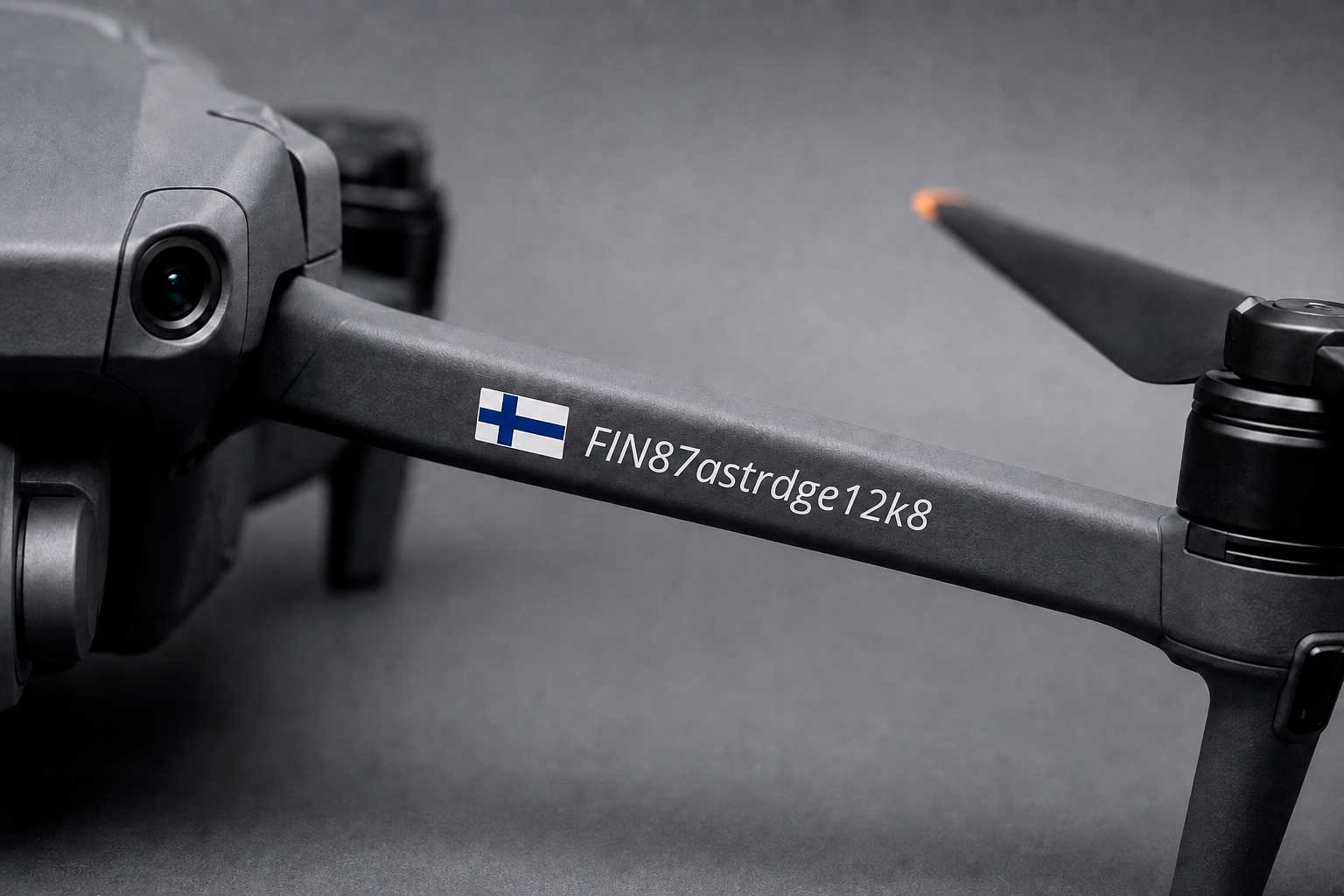 Drone operator ID sticker applied clearly to a drone arm