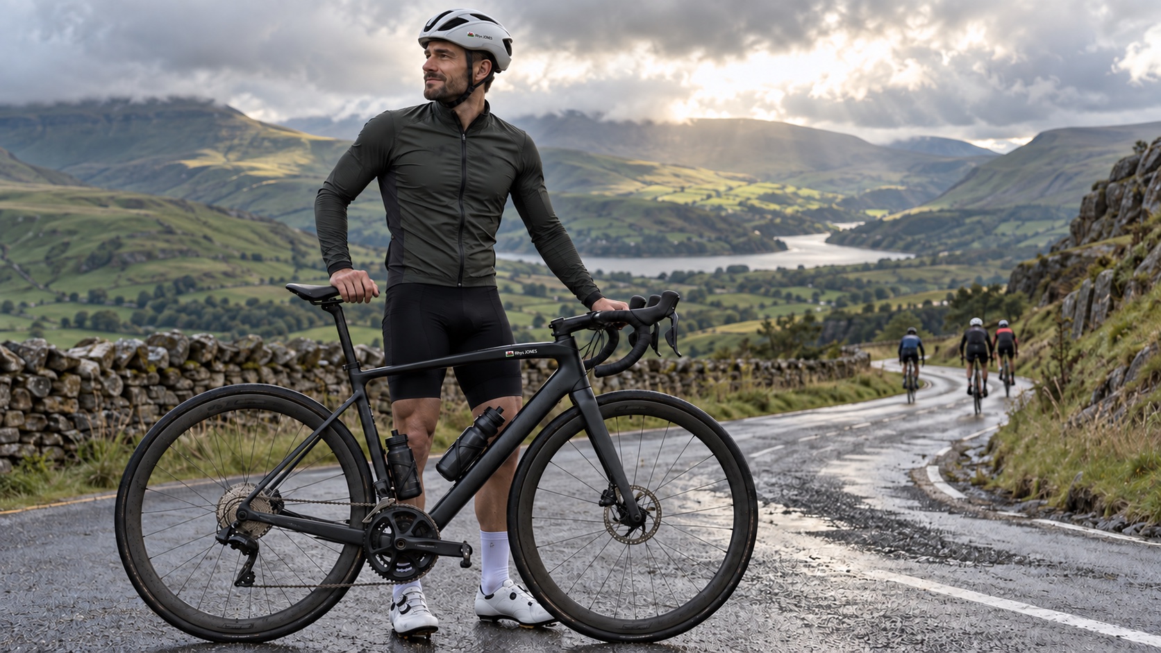 Welsh cyclist with personalised Pegatin name stickers on his road bike and helmet in the mountains for Dragon Ride